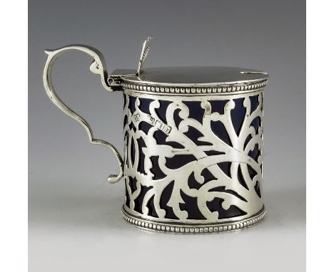 Charles Boyton II, London 1897, a Victorian silver mustard pot, cylindrical form, reticulated foliate scroll design between b