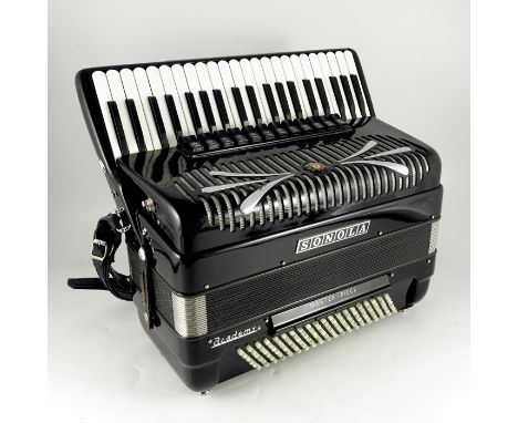 A Sonola piano 120 bass accordion Academy Master Piece, with pearlescent buttons, in a sudo fur lined case
