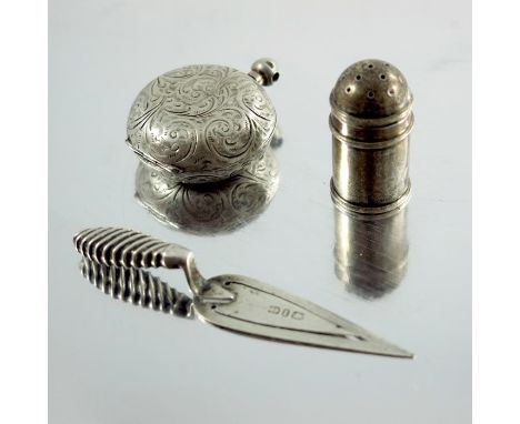 A Victorian novelty silver bookmark, Birmingham 1893, in the form of a trowel, together with a miniature pepper pot, Charles 