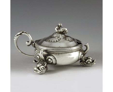 Simeon Greenberg, Birmingham 1861, a Victorian silver mustard pot, squat ovoid form, embossed with shell scroll motifs and ra