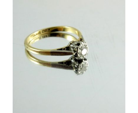 A diamond solitaire ring, approx. quarter carat stone, set in Platinum and on an 18 carat gold band, approx. size L