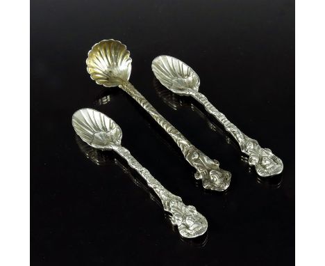 Three Victorian cast silver condiment spoons, Richard Sibley, London 1856 and John and Henry Lias, London 1845, Mask and Serp