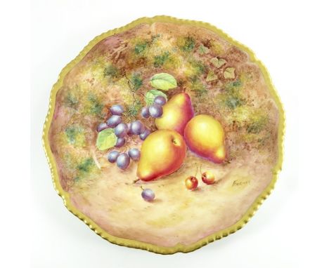 Freeman for Royal Worcester, a fruit painted plate, pears, grapes and cherries, in a gilt gadrooned rim, signed, 27cm diamete