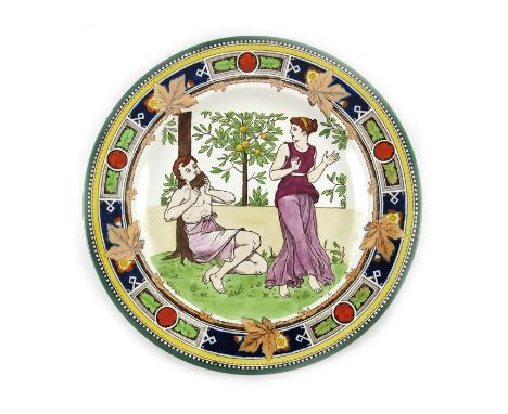 Walter Crane for Wedgwood, an Aesthetic Movement plate, printed and painted with a Classical scene of boy playing the pipes i