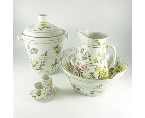 A George Jones Azalea toilet set, relief moulded coopered barrel form with transfer floral sprigs, including wash basin, jug,