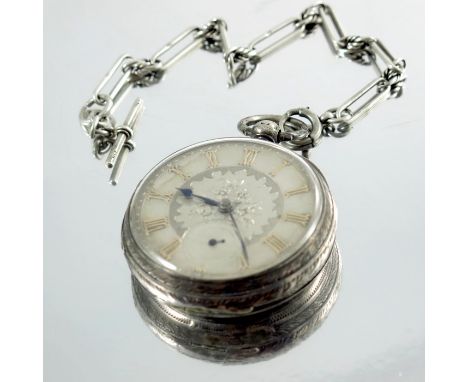 A large Victorian silver pocket watch on chain, silvered and engine turned dial with Gothic numerals, the case chased and ins