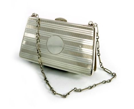 A George V silver evening purse , Birmingham 1917, solid sided with leather concertina pouch interior, engine turned stripes,