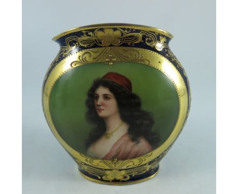 A Vienna style portrait vase, flattened ovoid form, tooled gilt, 14.5cm high