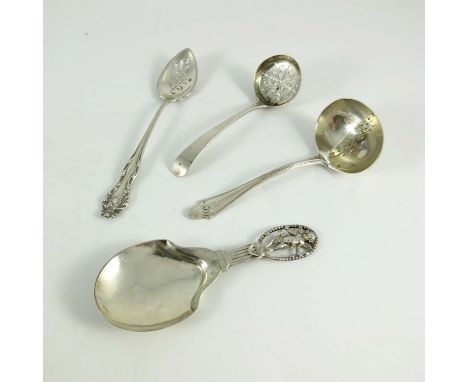 A collection of silver strainer spoons, including American, Dutch and English, Edwardian and later, various dates and makers,