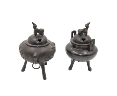 Small Japanese bronzed koro and cover, of compressed spherical form with twin zoomorphic mounted ring handles and decorated w