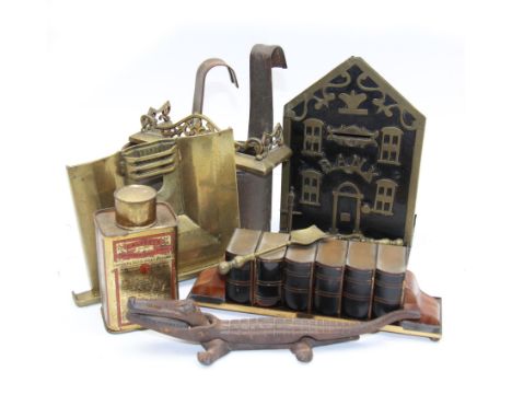 Collection of metal ware, including travelling salesman's brass fireplace, novelty money bank, ashtray bookshelf and a crocod