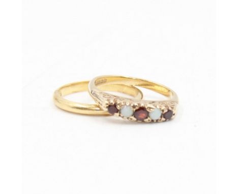 18ct gold wedding band and a 9ct gold opal and garnet five stone ring, both hallmarked Condition Report:18ct approx 2.25 gram
