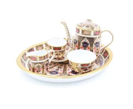 Royal Crown Derby Imari pattern 1128 miniature cabaret set, comprising tray, teapot, milk jug, sucrier, teacup and saucer