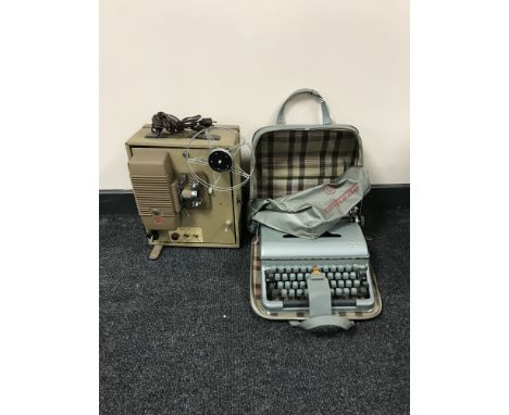 A cased Kodak Kodascope eight-500 projector together with a case Torpedo typewriter 