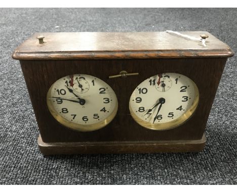 An oak cased pigeon clock