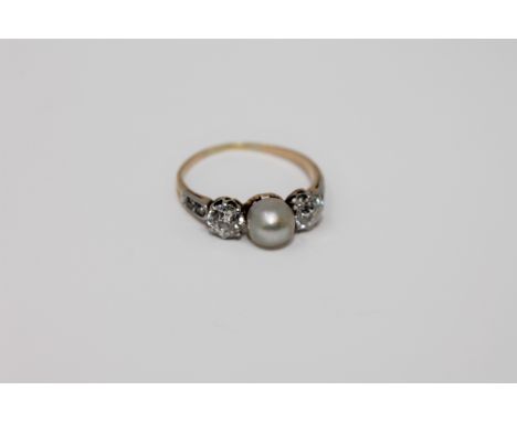 An antique 18ct gold pearl and diamond ring CONDITION REPORT: The ring is in good condition. The pearl is 6.1mm in diameter. 