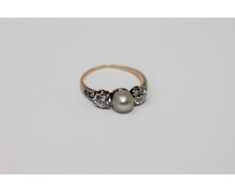 An antique 18ct gold pearl and diamond ring CONDITION REPORT: The ring is in good condition. The pearl is 6.1mm in diameter. 