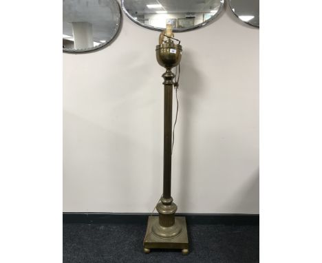 A brass Corinthian column standard lamp