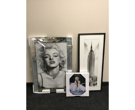 A large framed picture Marilyn Monroe in mirrored frame together with wall clock and framed black and white print - Empire st