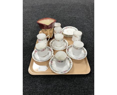 A tray of eight Paragon Belinda china cups and saucers together with a Royal Doulton character jug - The Cardinal 