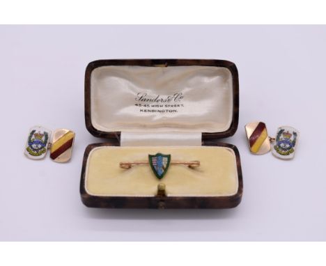 Of military interest: a pair of Middlesex Regiment gold and enamel cufflinks, stamped 9ct; together with a gold and enamel ti