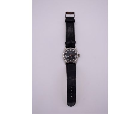 A circa 1991 stainless steel manual wind wristwatch,&nbsp;having Rolex cal 1210 movement, 34mm, on replacement black leather 