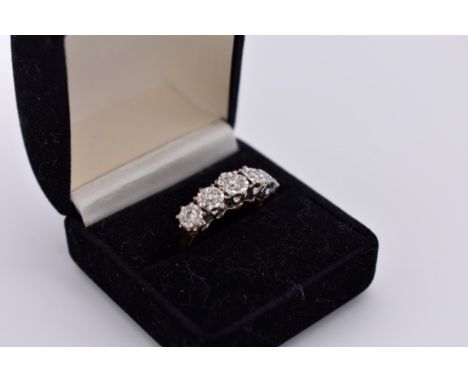 A diamond five stone gold ring, hallmarked 18ct, 0.45ct approximately, 5.2g total weight. 