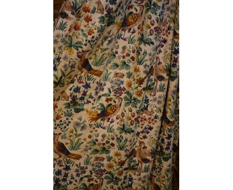 A pair of lined Arts &amp; Crafts style Sanderson print 'Cluny' design curtains, neutral ground with birds and hares amongst 
