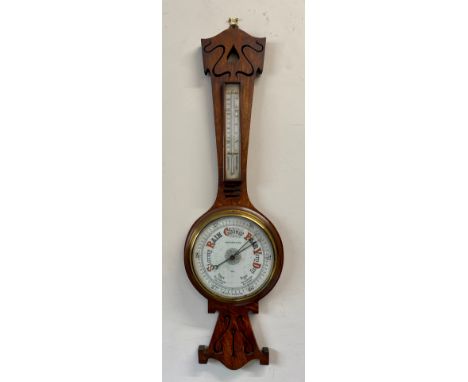 An Art Nouveau oak aneroid barometer, Robert Curtis &amp; Son, Hull. 91cm h. 