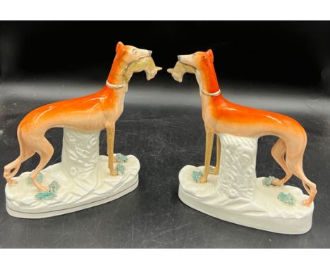 A pair of 19thC Staffordshire greyhounds with hares in  their mouths. 27cm h and three various ceramic birds. 