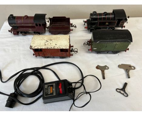 A Hornby 5600 0-4-0 clockwork loco &amp; tender LMS, Hornby locomotive, type 40, No.3 82011, A Hornby O Gauge Goods Brake Van