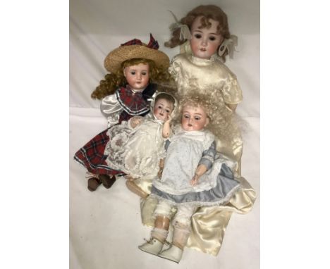 Four bisque headed dolls to include an Alt Beck &amp; Gottschalck with a cropped brown wig, sleeping brown eyes 28cm h, a dol