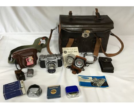 A Voigtländer Prominent 35mm rangefinder camera, serial number B66903 with Voigtländer case,  Voigtländer filter, exposure me