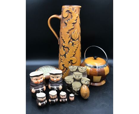 A mixed lot to include West German Goebel monk character jugs, Lancraft woodware biscuit barrel and rosebowl, tall Knodgen We