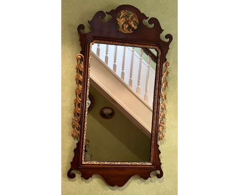 A mahogany fretted wall mirror with gilt decoration. 95 h x 51.5cm w. 