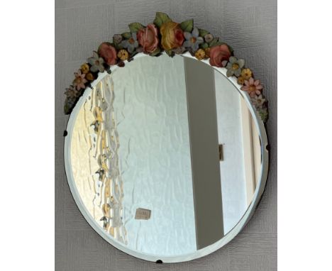 Floral decorated bevel edged wall mirror. 37cm. 