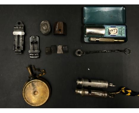 A collection of miscellaneous items to include a vintage 'Gillette blue' shaving set in a blue painted tin case, Two whistles