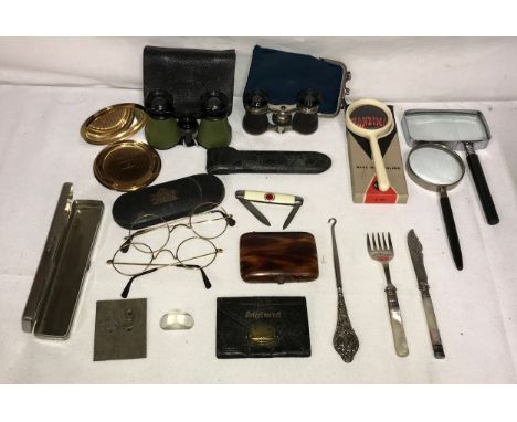 Miscellany to include 2 pairs of opera glasses, child's fish knife and fork, 3 magnifying glasses, cigarette case, Mascot pow