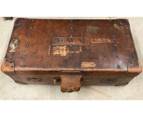 A good quality early 20thC Vintage solid leather travel trunk, stamped John Pound &amp; Co of London. With riveted reinforced