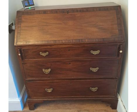 A 19thC mahogany fall front bureau. Cross banding to fall front, standing on bracket feet. 112cmh x100w x 48d. 