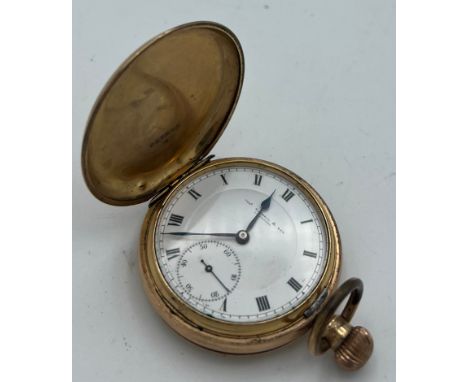 Gold plated hunter pocket watch. 5cm diameter. Thomas Russell and son Liverpool. White enamel dial with subsidiary seconds di