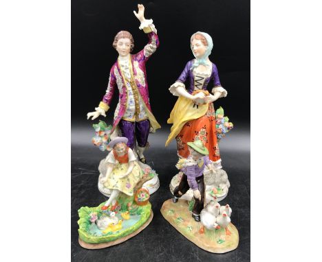 Four Sitzendorf figures. Tallest standing at 27cm. 