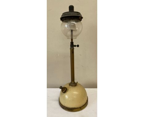 A Mid 20thC Tilley 'Table Model' paraffin lamp with Tilley Durosil 182 glass globe and original lamp shade. 54cm h.