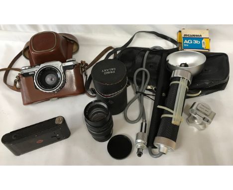 Two cameras associated equipment to include an Edixa Mat Reflex in fitted case, a Kodak 1127 in case, a Prinz Galaxy Lense 1.