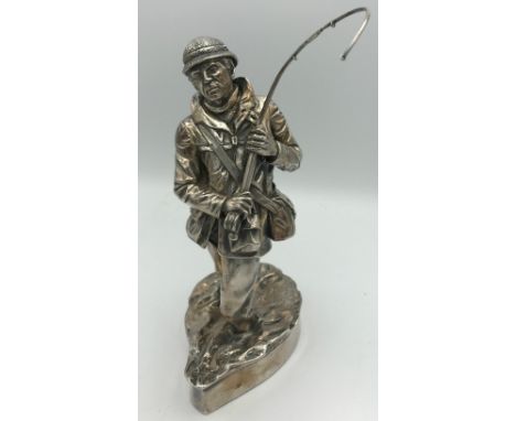 A silver figure of a fisherman Sheffield 1987 maker HL. Marked 'filled' to base and signed R. Chadwick.Total weight 838gm (we