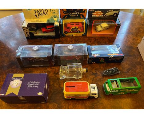 A collection of toys to include Corgi Fawlty Towers 00802 Austin 1300 Estate &amp; Basil Fawlty, Corgi 434 Charlie's Angels C