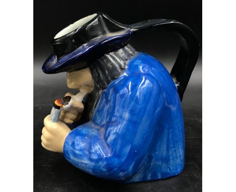 A Henroit Quimper toby smoking pipe jug 15cm h signed a g to underneath. 
