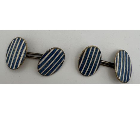 Nine carat gold and enamel cufflinks with white metal joiners. Total weight 5.7gm. 