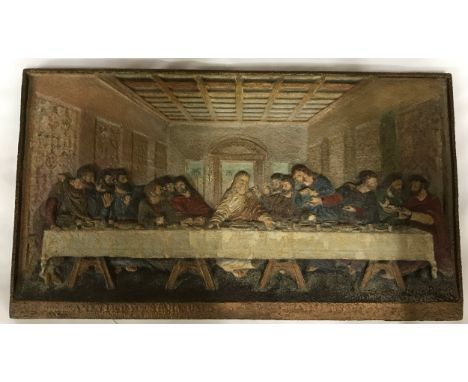 A 20th Century cast iron plaque depicting The Last Supper, polychrome detailing, 37 x 65cm. 