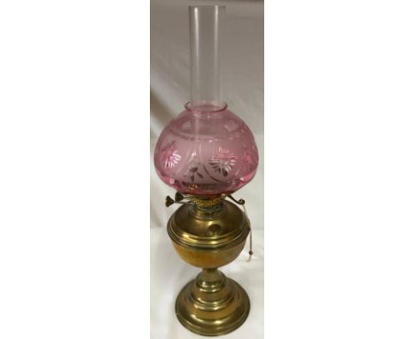 Brass oil lamp along with chimney and shade, lamp height 35cm, with chimney 57cm. 